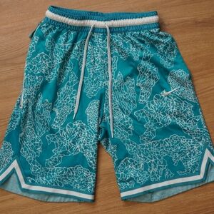 Nike Teal Athletic Shorts with White Pattern